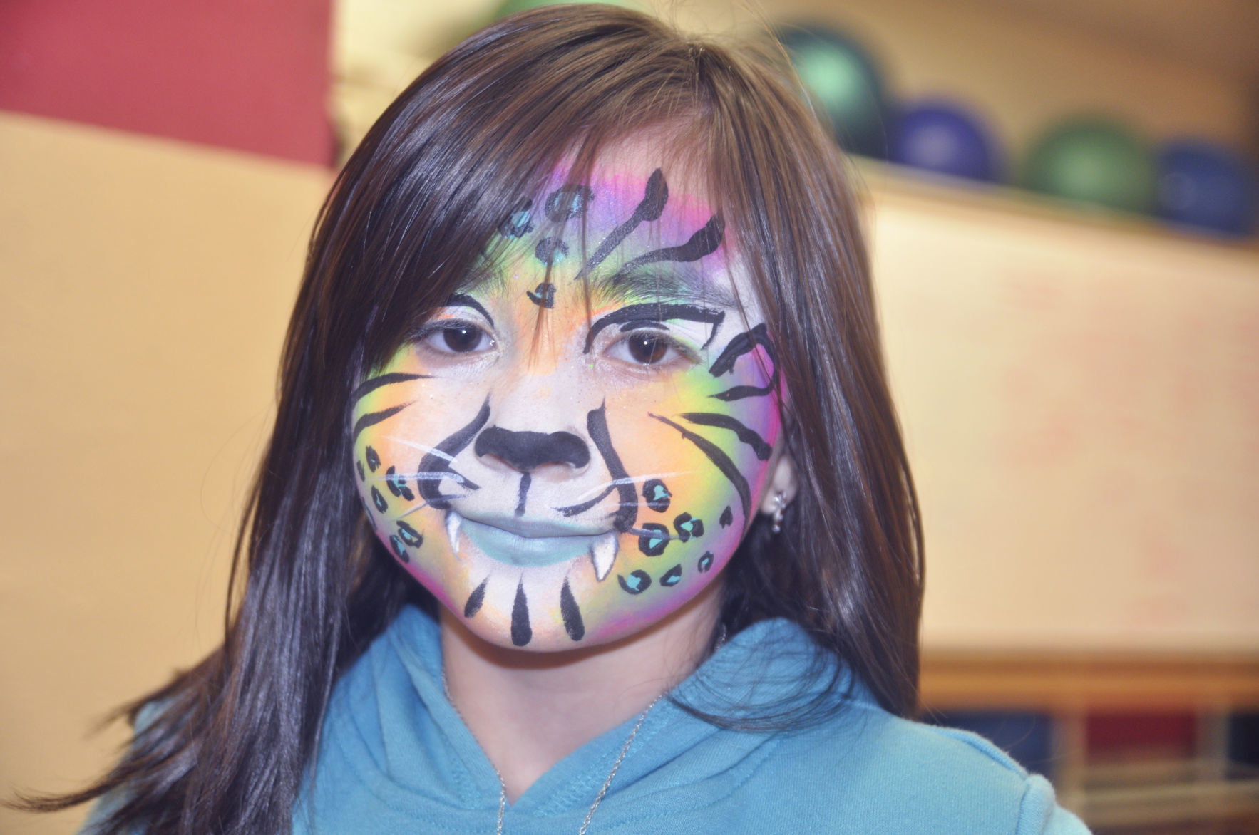 Kids Expo - face-painted girl